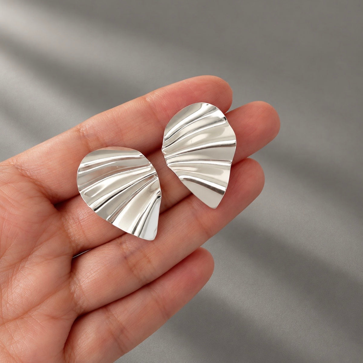 Aretes Buclé