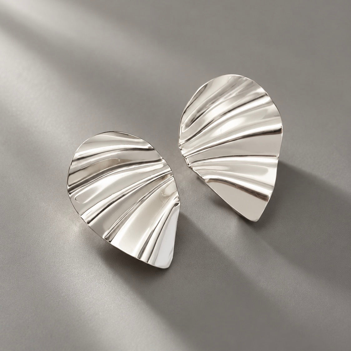 Aretes Buclé